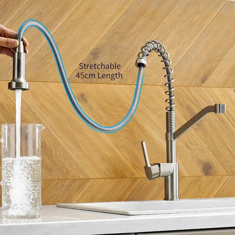 Modern matte black brass kitchen faucet with pull down sprayer