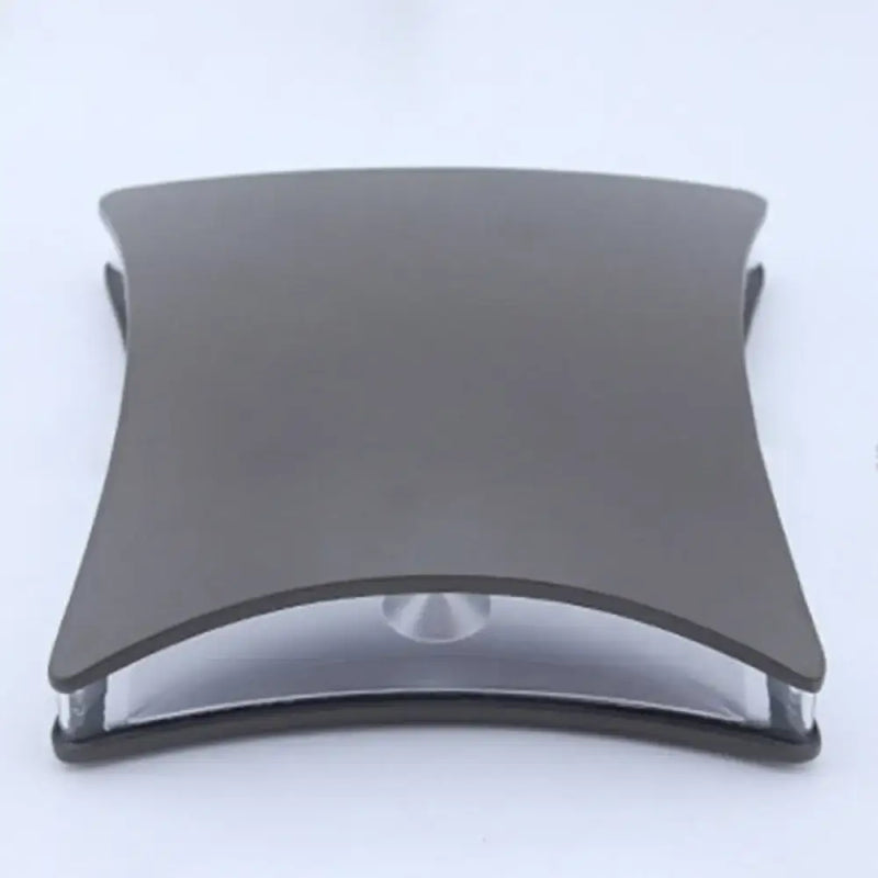 Modern matte black curved desk lamp with glass accent for bedroom