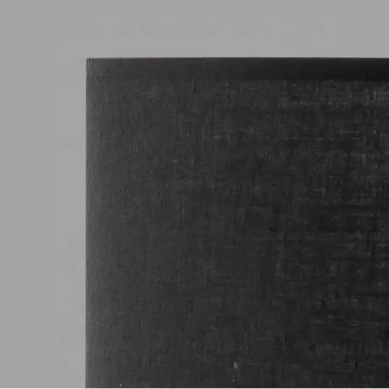 Modern matte black metal table lamp with fabric shade for living room
