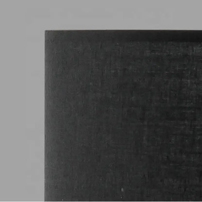 Modern matte black metal table lamp with fabric shade for living room