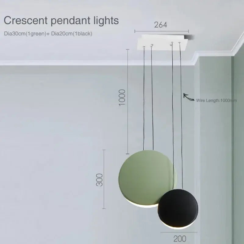 Modern matte black & muted green crescent moon chandelier dining room