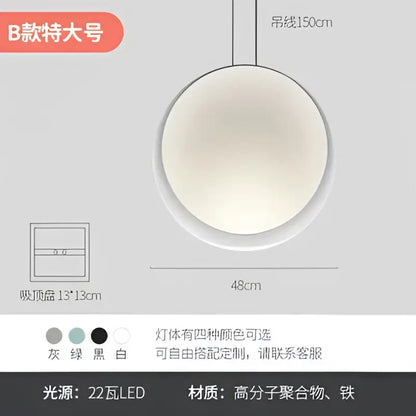 Modern matte black & muted green crescent moon chandelier dining room