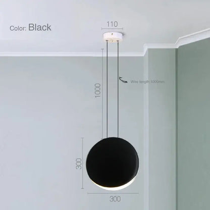 Modern matte black & muted green crescent moon chandelier dining room