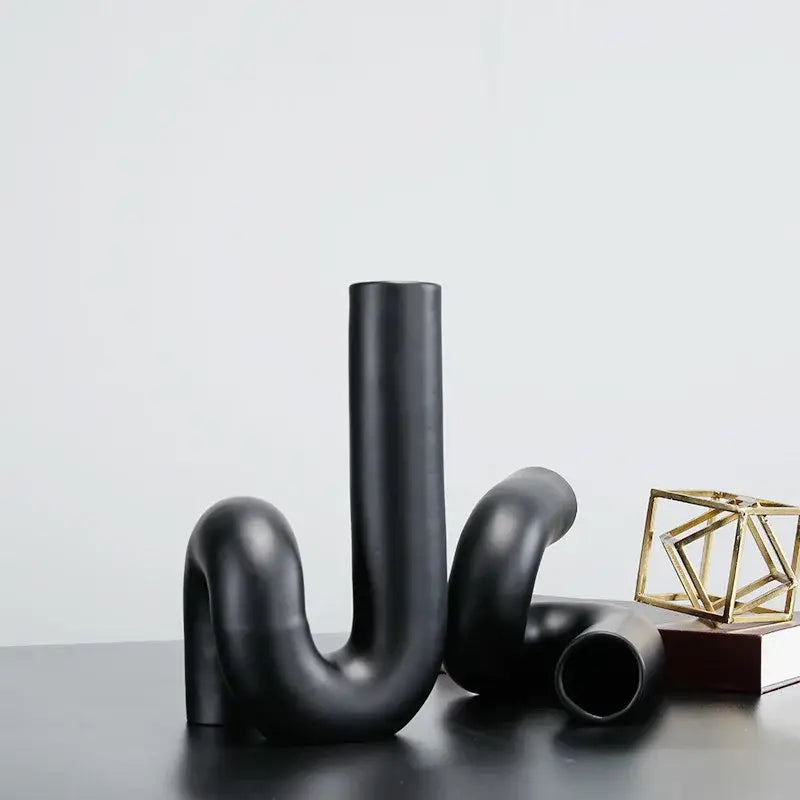 Modern matte black pipe geometric twist knot figurine living room decor