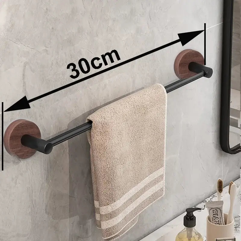 Modern matte black wall mounted towel bar with wood accents bathroom