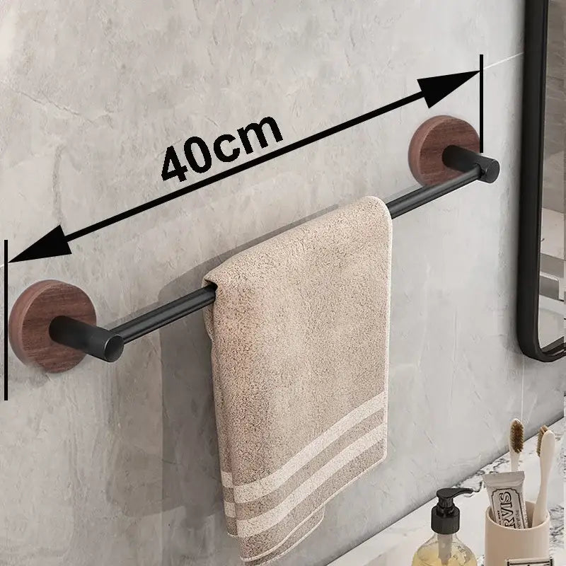 Modern matte black wall mounted towel bar with wood accents bathroom
