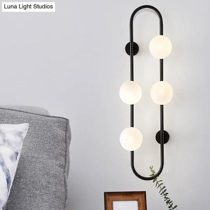 DecorBites™ Modern Matte White Glass Globe Wall Sconce with 4-Light Bedroom Lighting Ideas in Black/Gold