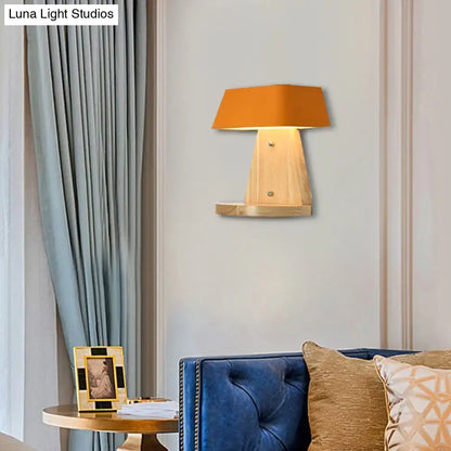 Modern metal trapezoid wall sconce with wooden backplate living room