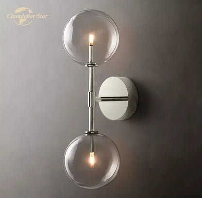 Modern metallic clear glass globe wall sconce bedroom light