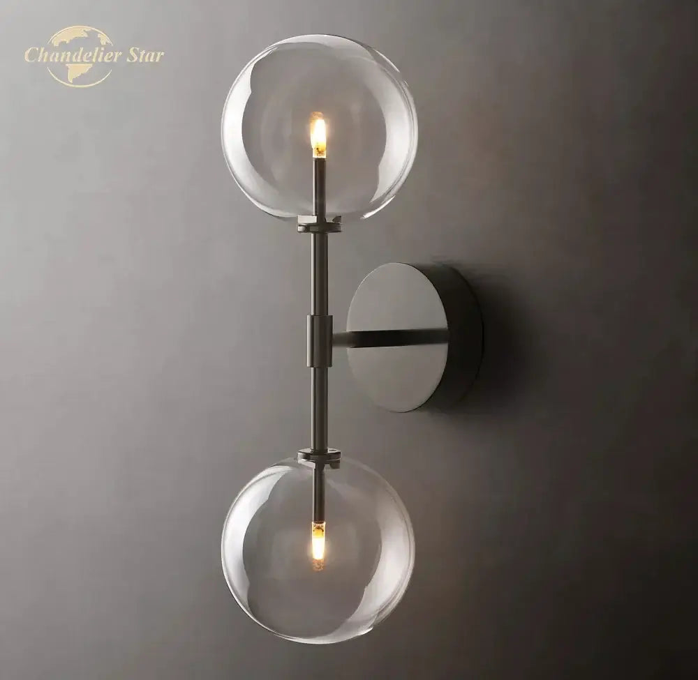 Modern metallic clear glass globe wall sconce bedroom light