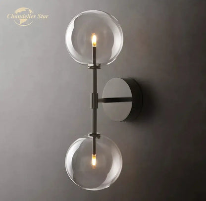 Modern metallic clear glass globe wall sconce bedroom light