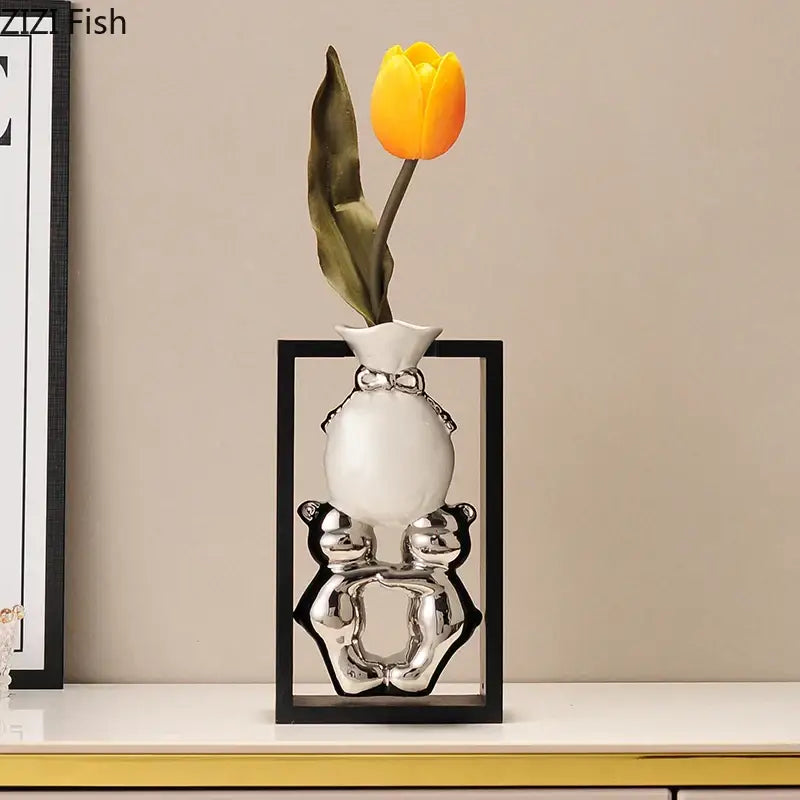 Modern metallic oval ceramic vase with artificial flowers – desk decor