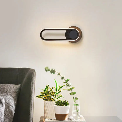 Modern minimalist black matte oval led wall sconce living room light