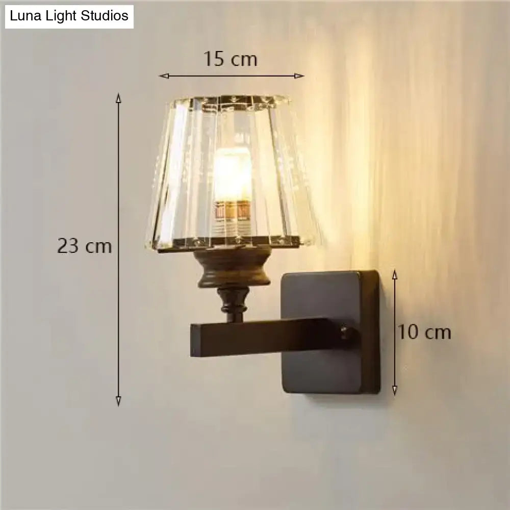 Modern minimalist gold wall lamp with crystal shade for bedroom