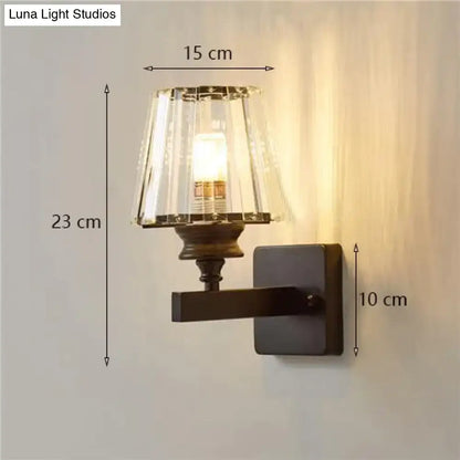 Modern minimalist gold wall lamp with crystal shade for bedroom