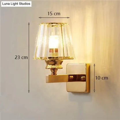 Modern minimalist gold wall lamp with crystal shade for bedroom