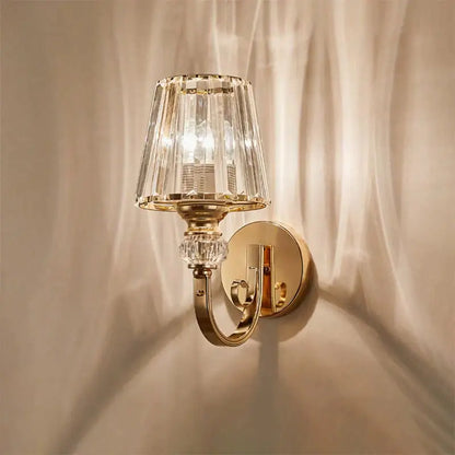 Modern minimalist gold wall lamp with crystal shade for bedroom