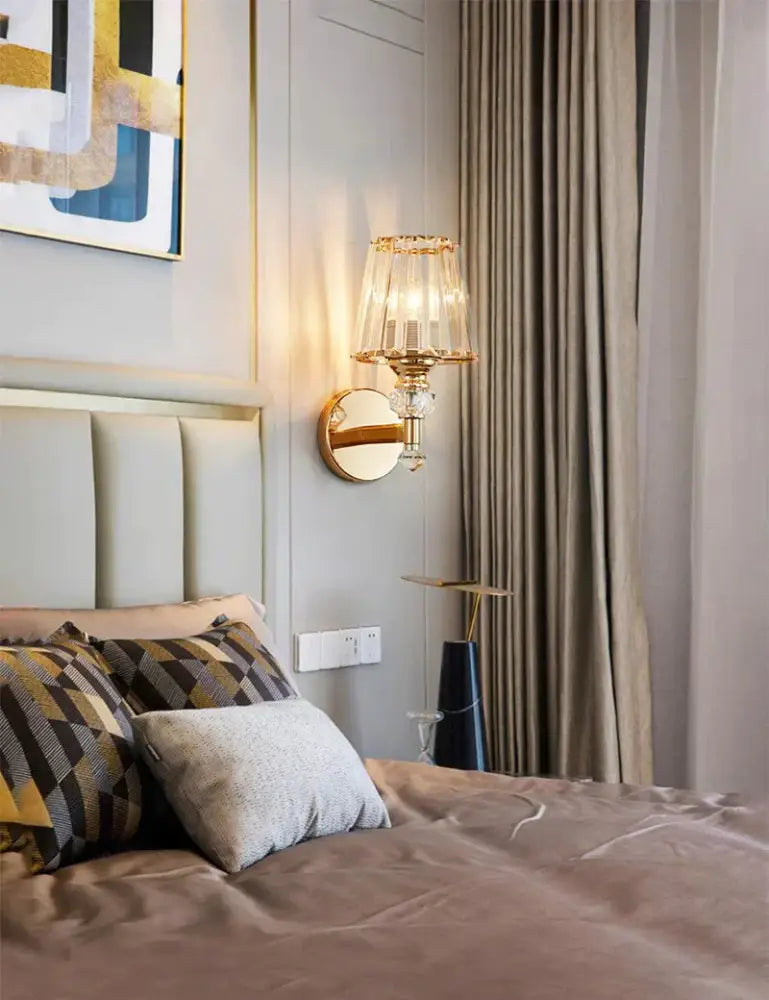 Modern minimalist gold wall lamp with crystal shade for bedroom