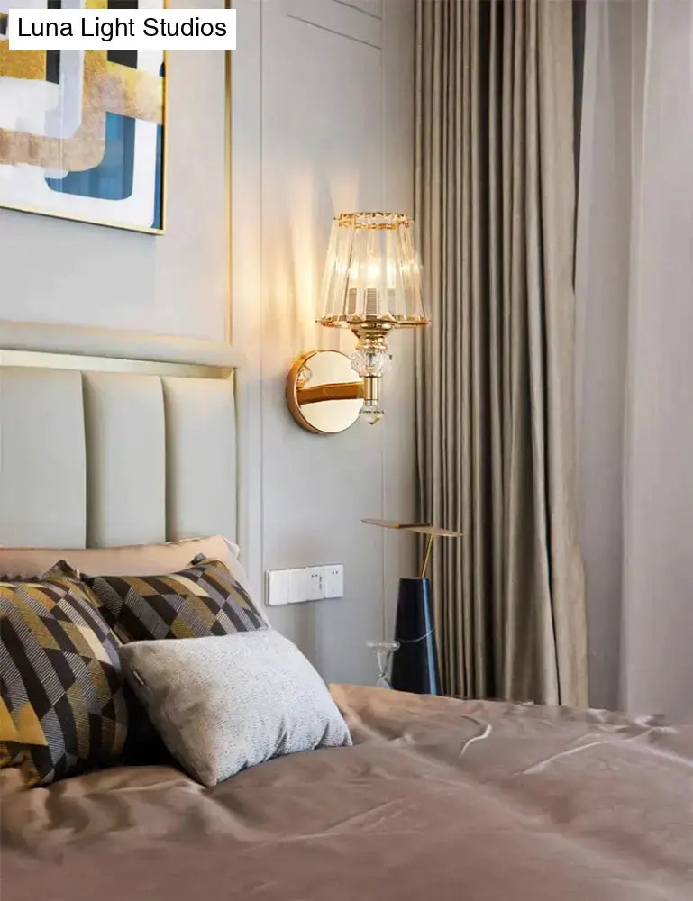 Modern minimalist gold wall lamp with crystal shade for bedroom