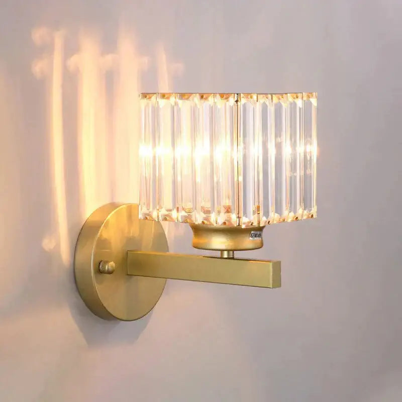 Modern minimalist gold wall lamp with crystal shade for bedroom
