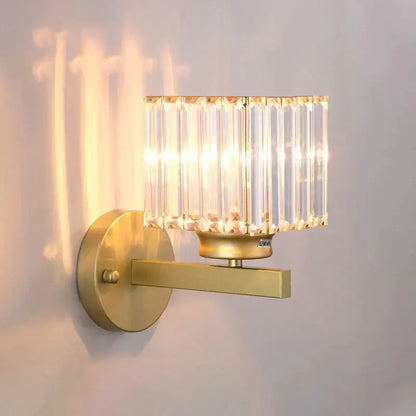 Modern minimalist gold wall lamp with crystal shade for bedroom