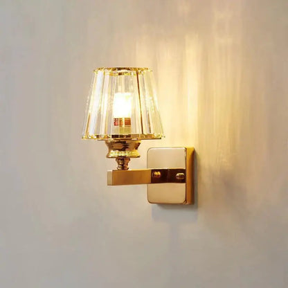 Modern minimalist gold wall lamp with crystal shade for bedroom