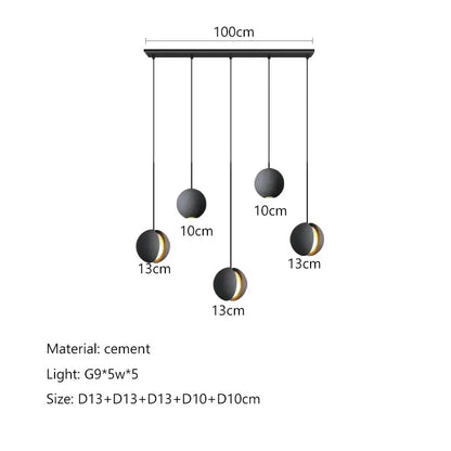 Modern minimalist gray and gold pendant light dining room