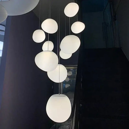 Modern minimalist white cobblestone glass led pendant light stairway