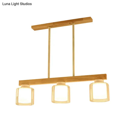 Modern minimalist wood and white glass pendant light dining room