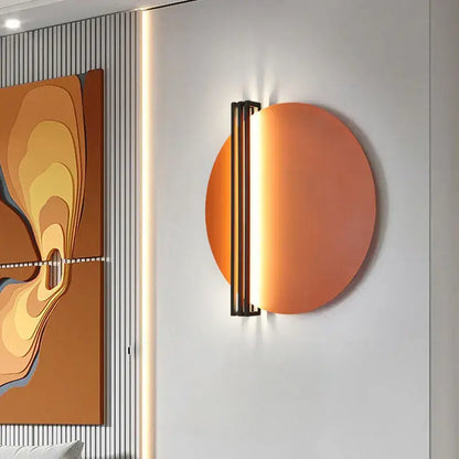 Modern orange and black circular wall lamp for bedroom