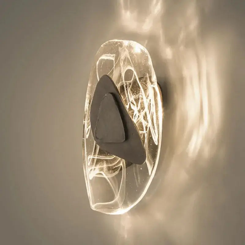 Modern oval crystal wall lamp for bedroom with abstract filament