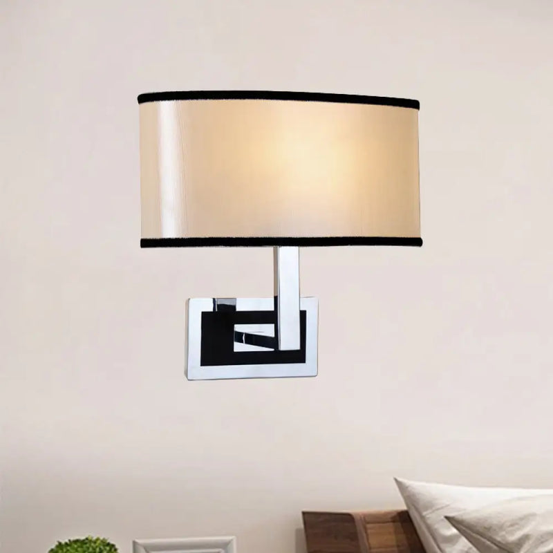 DecorBites™ Modern Oval Wall Sconce: Chrome LED Fabric Lighting for Bedside