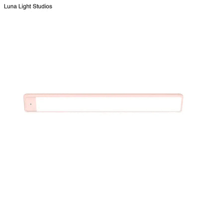 Modern pink elongated vanity lighting fixture for bedroom