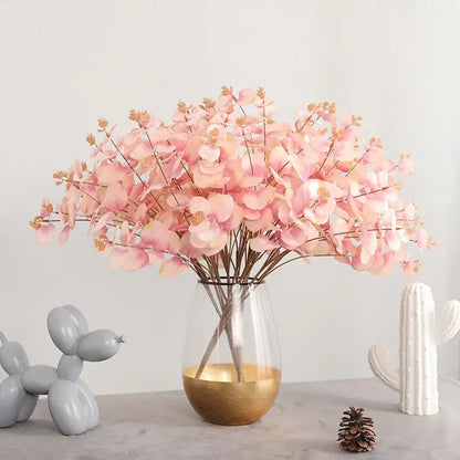 Modern pink eucalyptus flower arrangement living room glass vase