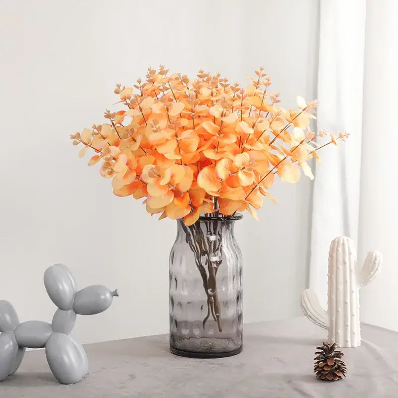 Modern pink eucalyptus flower arrangement living room glass vase