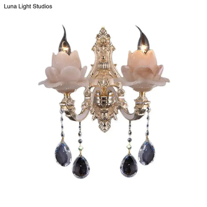 Modern pink lotus wall lamp with teardrop crystal – bedroom sconce