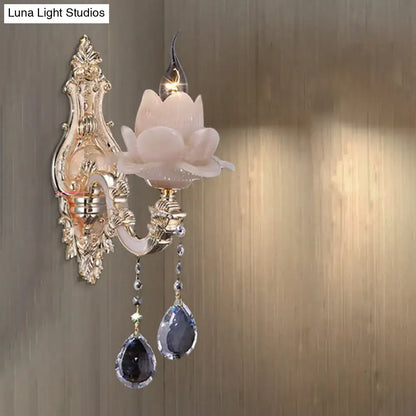 Modern pink lotus wall lamp with teardrop crystal – bedroom sconce