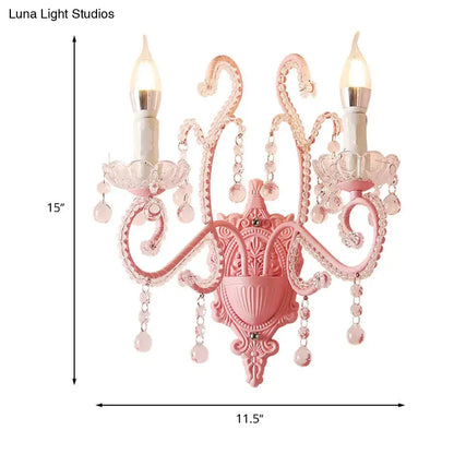 Modern pink metallic scroll arm wall lamp with crystal bedroom sconce