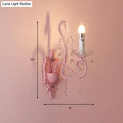 Modern pink metallic scroll arm wall lamp with crystal bedroom sconce