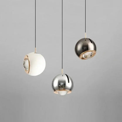 Modern polished metallic adjustable angle pendant light dining room