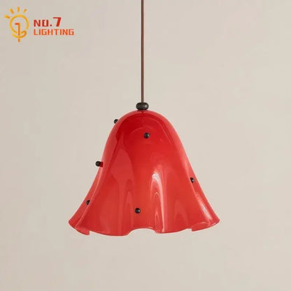 Modern red glass pendant light with black dots for dining room