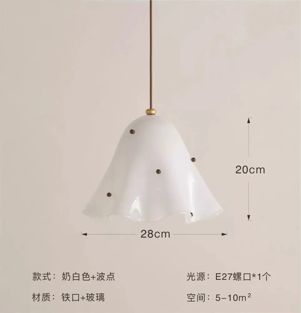 Modern red glass pendant light with black dots for dining room