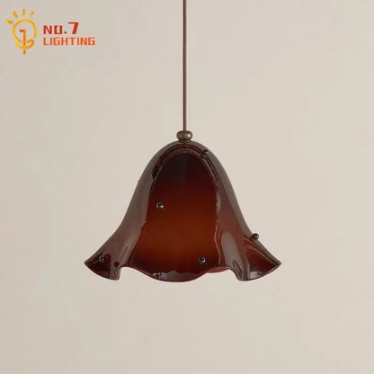 Modern red glass pendant light with black dots for dining room