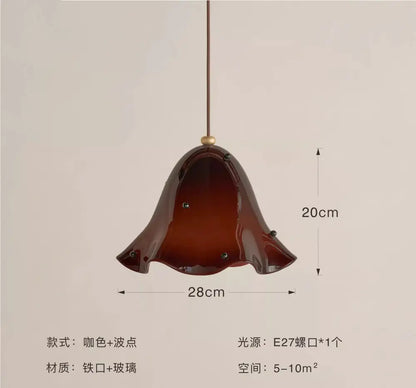 Modern red glass pendant light with black dots for dining room