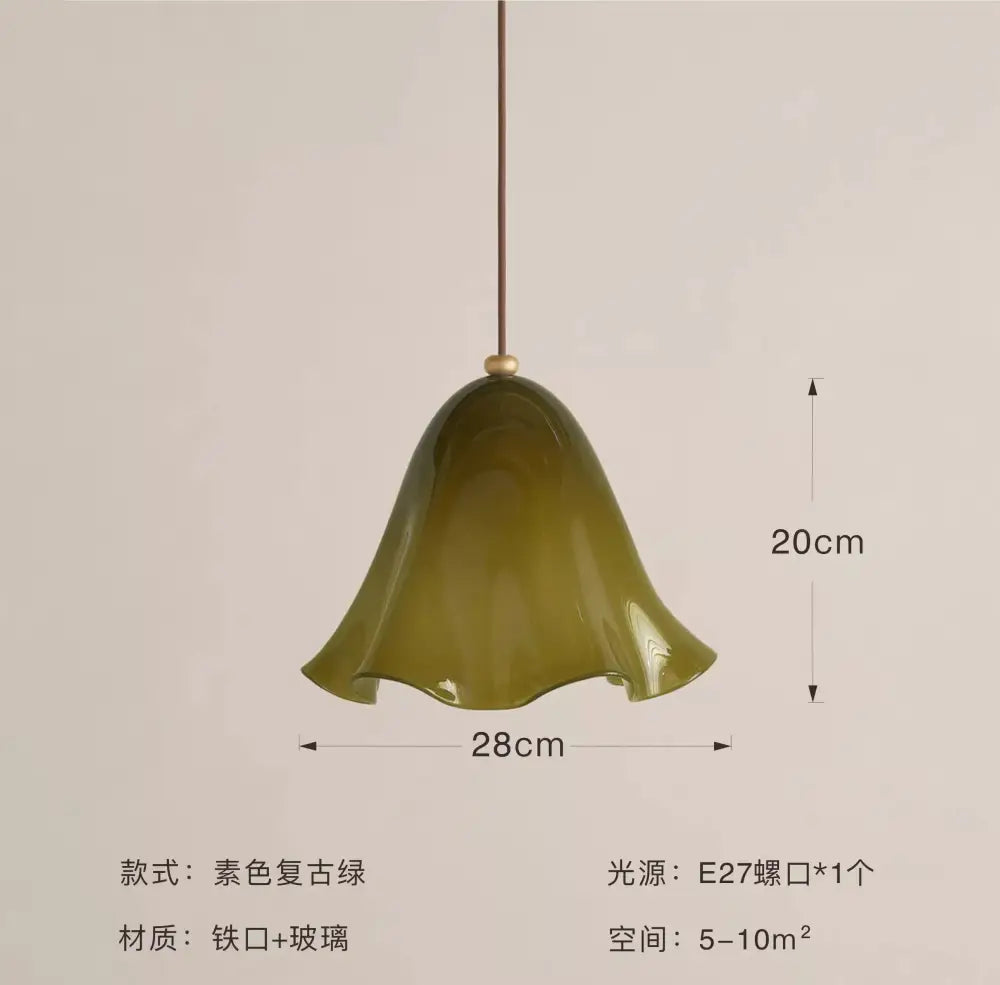 Modern red glass pendant light with black dots for dining room