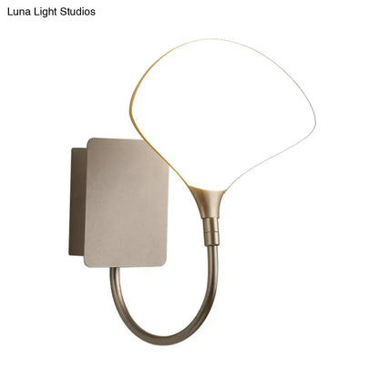 Modern silver arced arm wall lamp with acrylic shade bedroom light