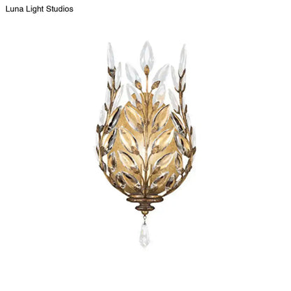 Modern silver & brass laurel wall light with crystal drop bedroom