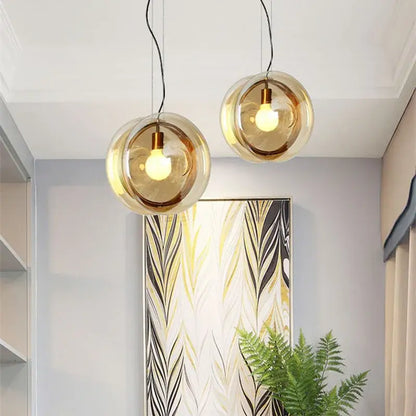 Modern spherical glass pendant lights dining room metallic accents