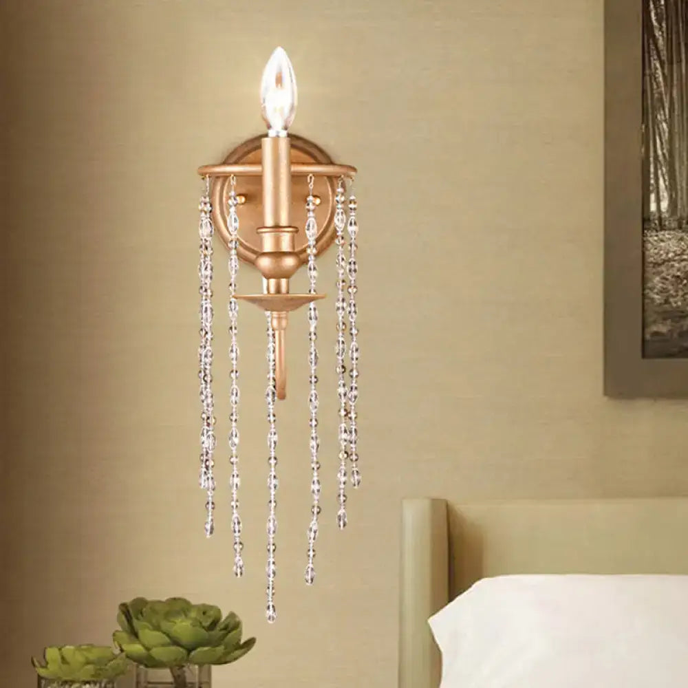 Modern style gold sconce with clear crystal beaded strand bedroom light