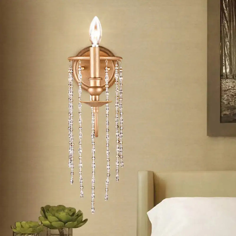 Modern style gold sconce with clear crystal beaded strand bedroom light